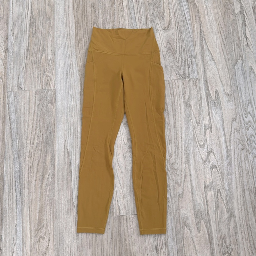 Size 4 Align lululemon leggings with side pockets in gold